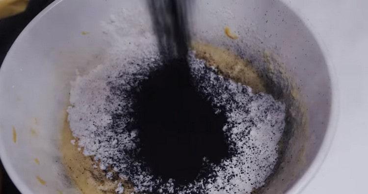 Add flour and again black dye.