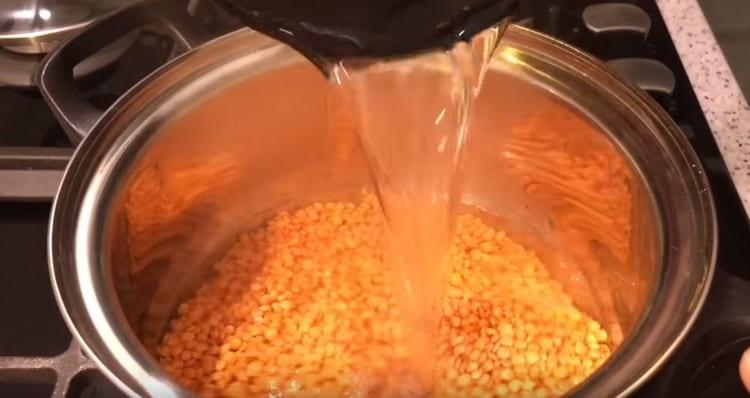 Add water and set the lentils to cook.