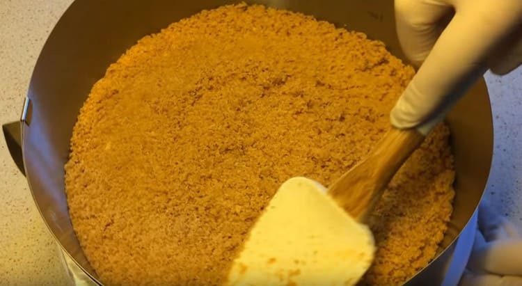 From the resulting crumbs, we form the basis for our cheesecake.
