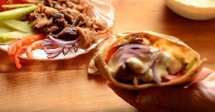 Add vegetables again, and put more sauce and onions on top.