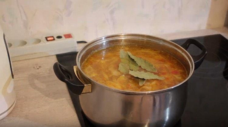 Add bay leaf to the dish.