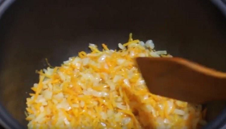 Fry chopped onions and carrots until soft.