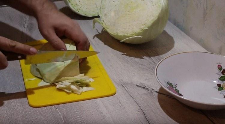 Finely chop the cabbage.