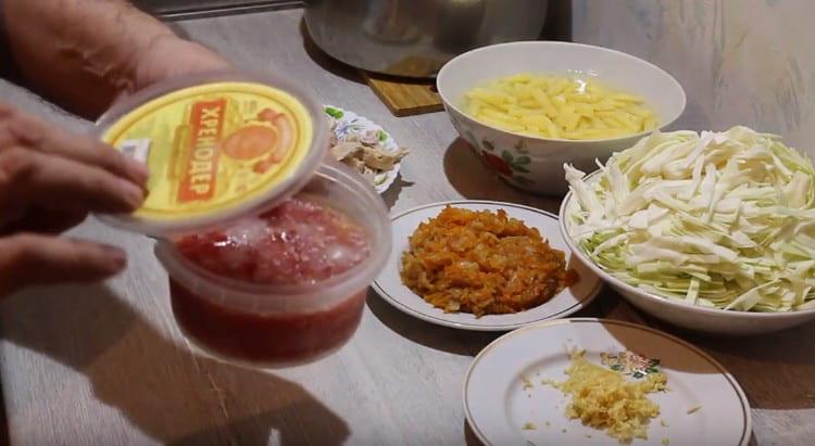 We use frozen or fresh tomatoes, cut into pieces.