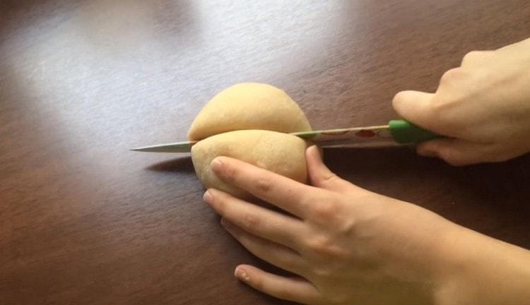 Cut the dough in half.