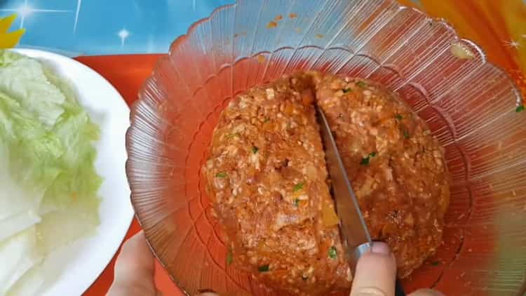 To make stuffed cabbage, divide the minced meat.