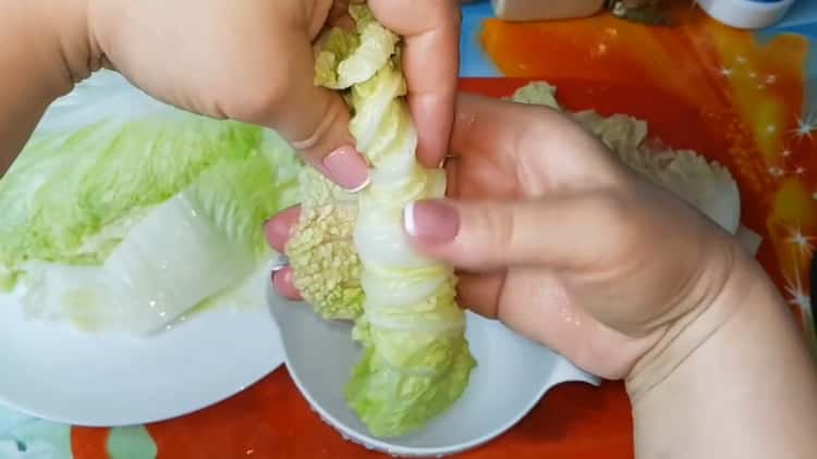 To prepare stuffed cabbage, fill the sheets with water