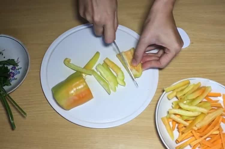 To cook the noodles, chop the pepper