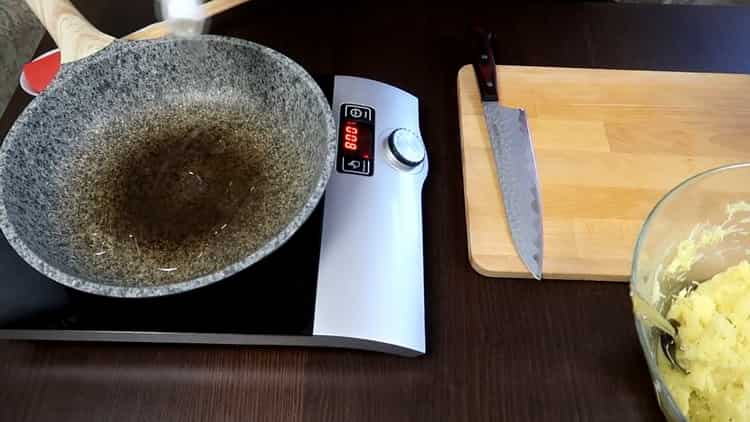 To cook potato pancakes, preheat the pan