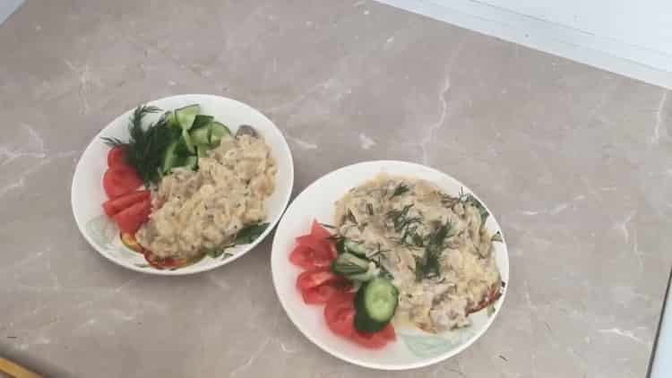 Julienne in a pan according to a step-by-step recipe with a photo