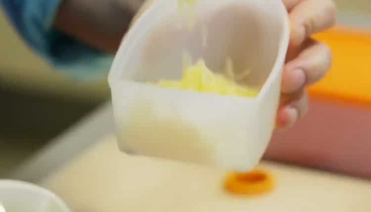 Grate cheese to cook