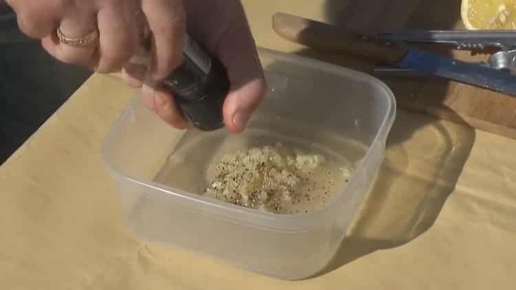 Grate garlic to make shrimp