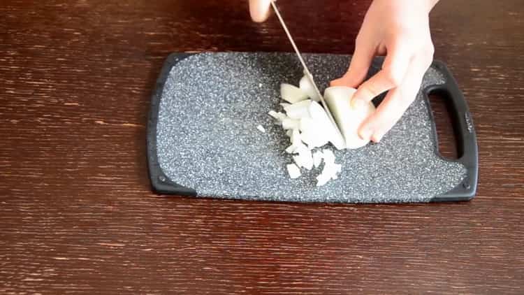 To make red bean lobio in Georgian, chop the onion