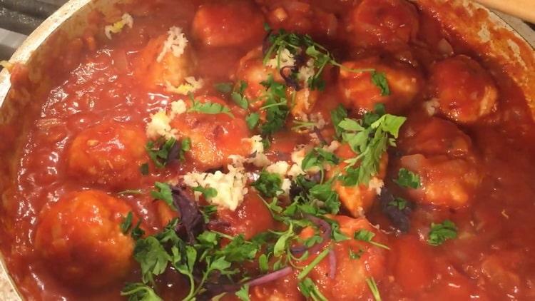 To cook pasta with cutlets, chop greens and garlic