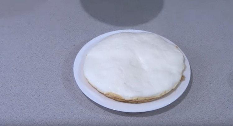 Gently place the omelet on a plate.