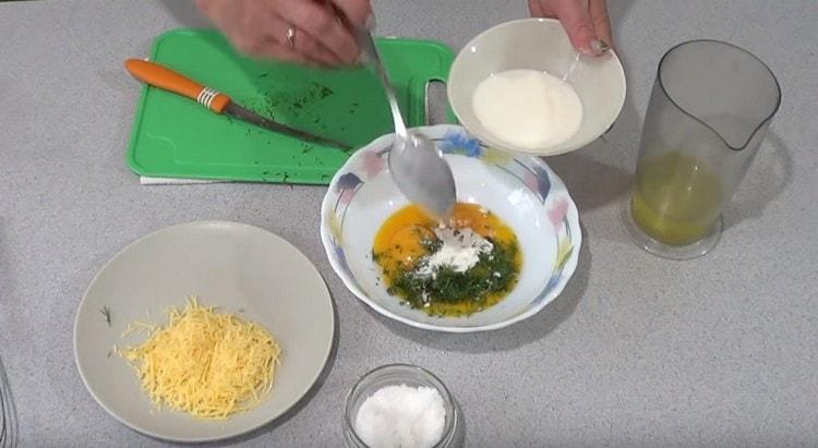 Add salt and milk to the yolks.