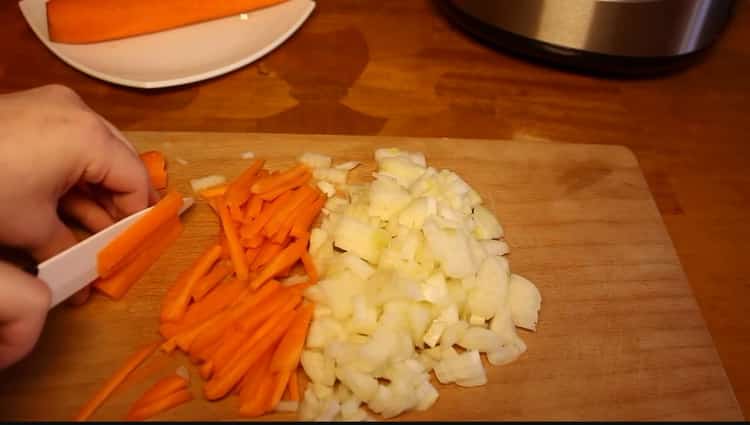 To cook pearl barley, chop the vegetables