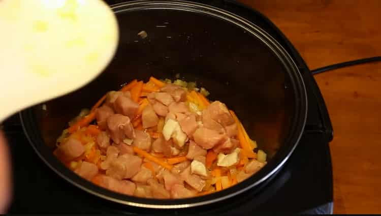 To cook pearl barley, fry the meat