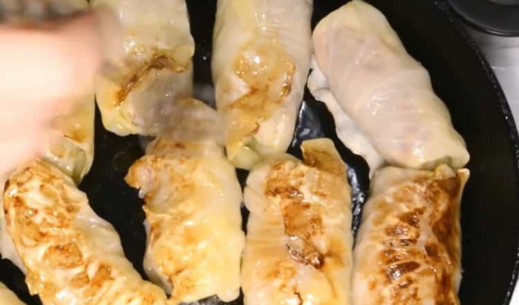 To cook cabbage rolls, preheat the oven