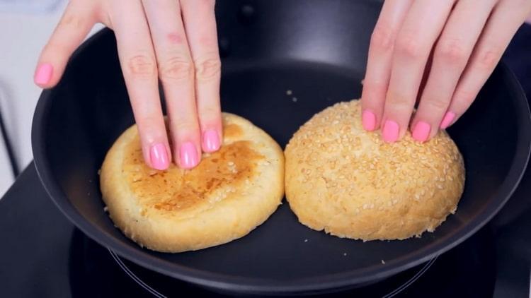 To make a crabsburger, dry the buns