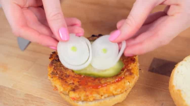 To cook a crabsburger, chop the onion