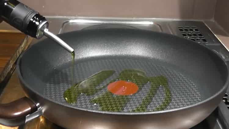 To cook rice with beans, heat the pan