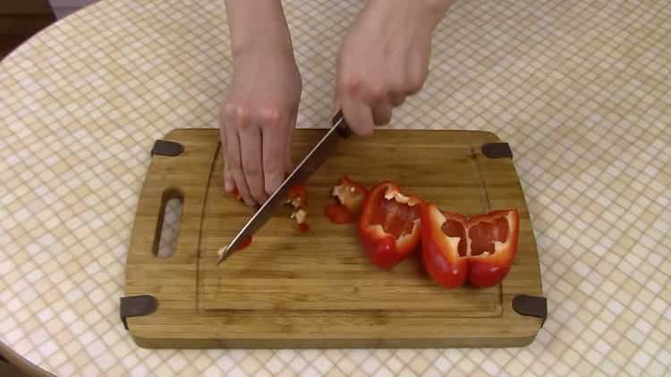 To cook rice noodles, chop the pepper