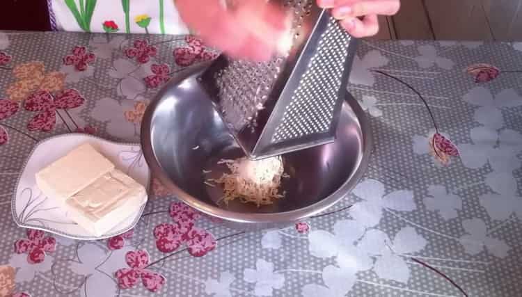 Grate cheese to cook
