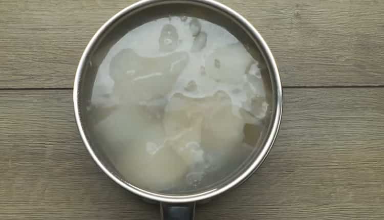 Cooking a salad with squid and cucumber