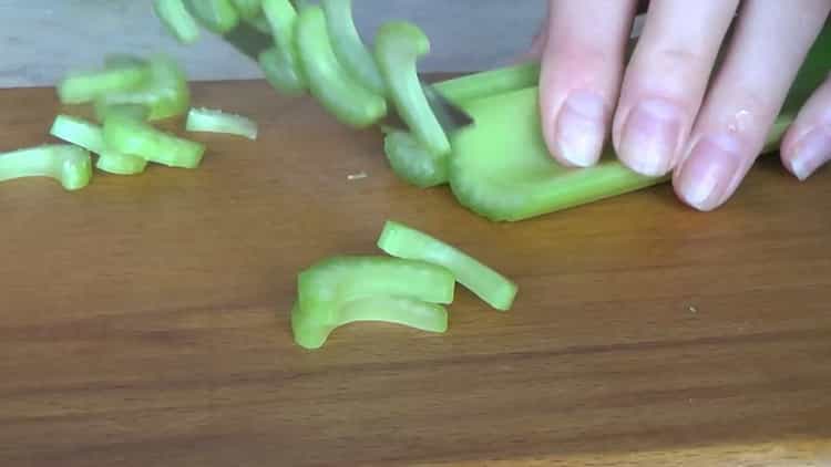 Cut celery to make a salad