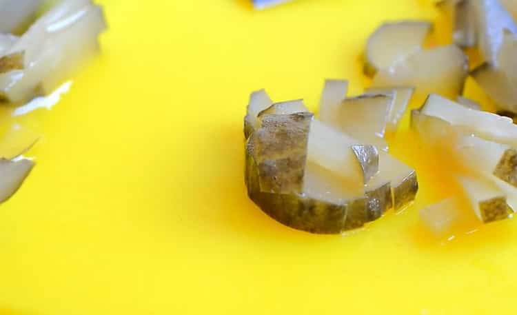 To make a salad, chop the cucumbers