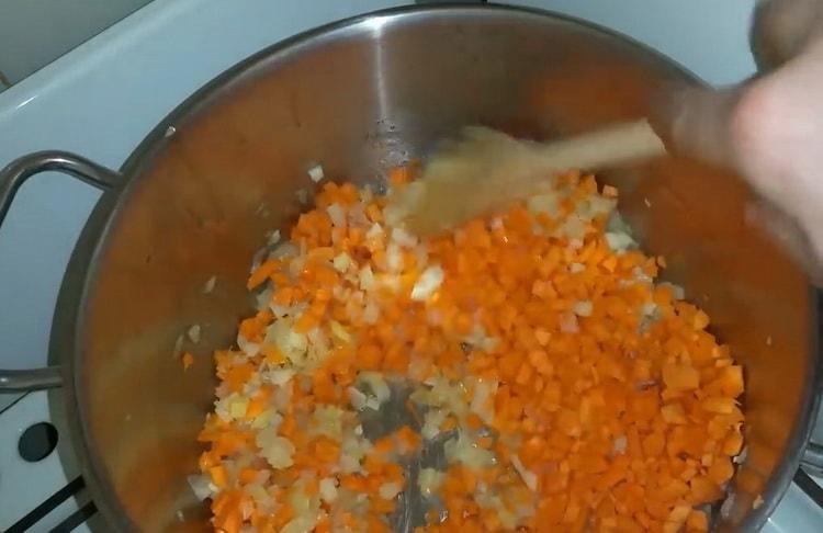 To make lentil soup, chop the carrots