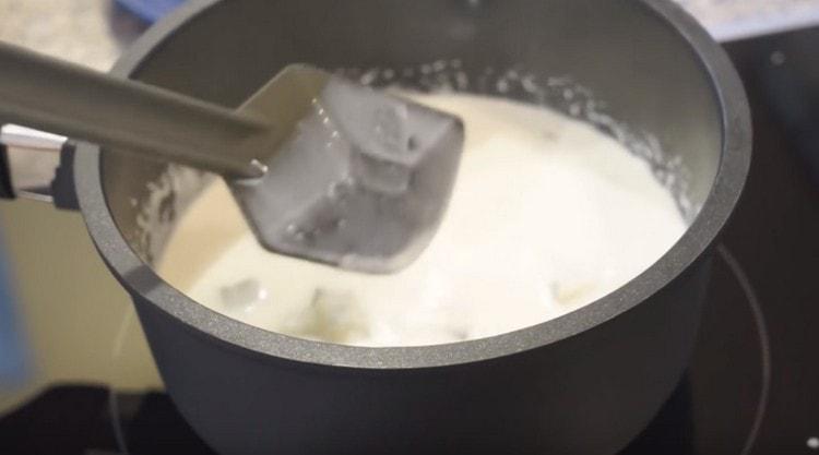 Cook the sauce, stirring it constantly.