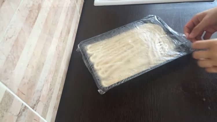 To prepare the dough for the lagman, cover with a film