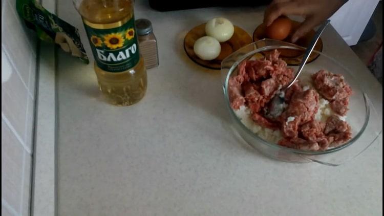 Cooking meatballs with minced meat with rice