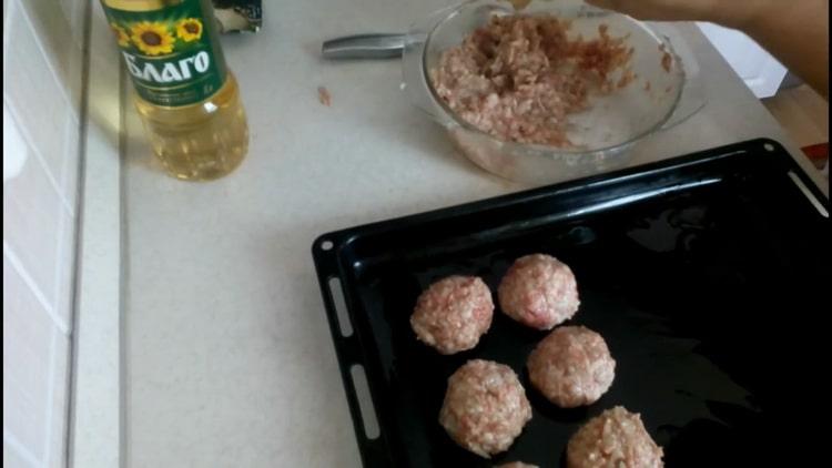 To cook meatballs, preheat the oven