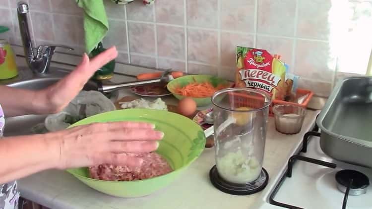 Cooking meatballs with gravy and rice in the oven
