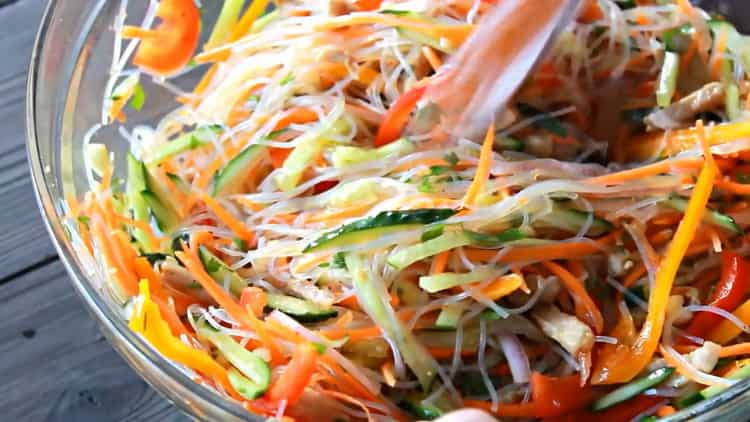 Mix the ingredients to make a salad.