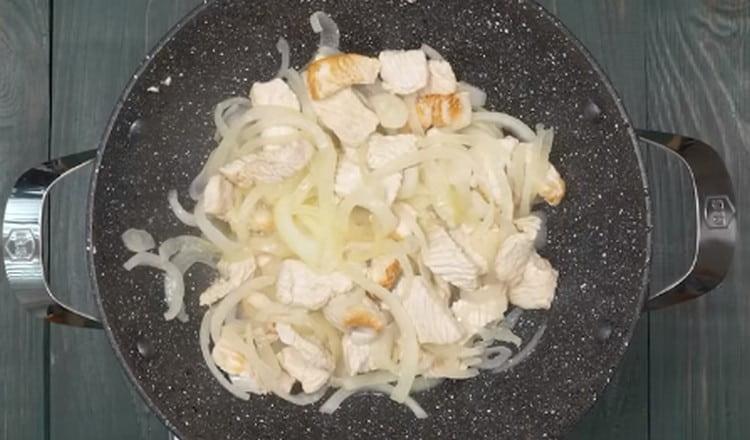 Add onion to the meat.