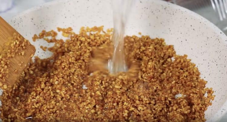 Fry the grits. add salt and boiling water.