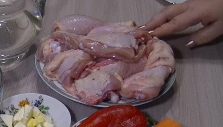 We wash the chicken thighs or legs.