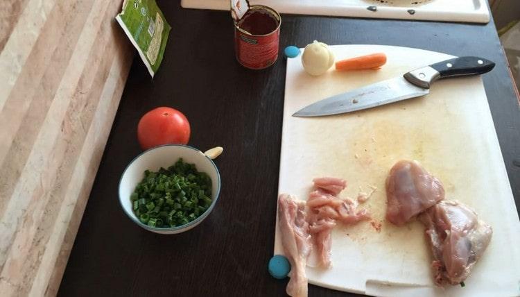 Cut the chicken into pieces.