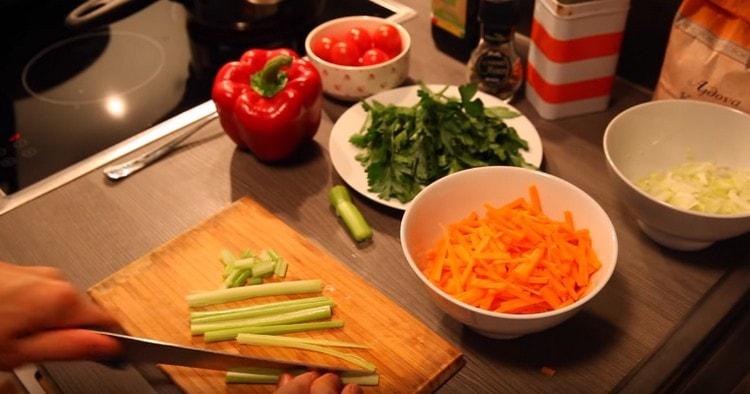 Cut the celery into strips.