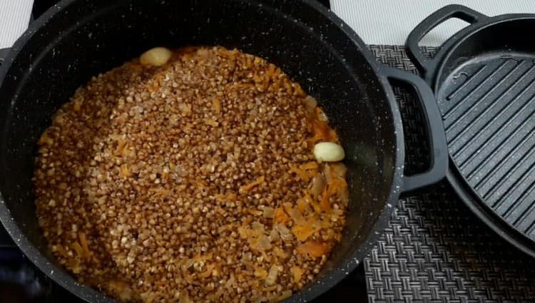 Appetizing buckwheat with pork is ready.