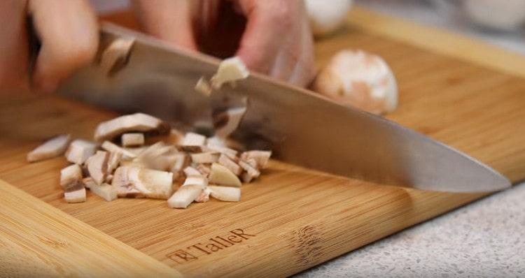 Cut the mushrooms.