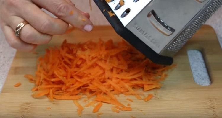 Grate carrots.