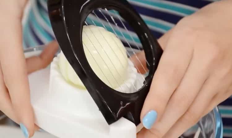 Cut eggs to make a salad
