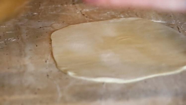 Roll out the dough to make tortilla