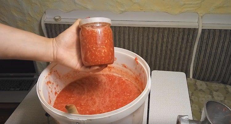 Adjika with horseradish is perfectly stored.