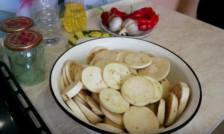 Salt the eggplant slices and leave for a few minutes.